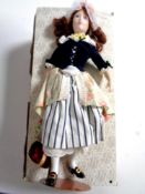 A Franklin Heirloom porcelain doll