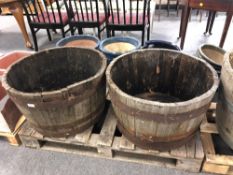 A pair of oak coopered barrel planters