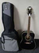 An Epiphone pro-1 plus EB acoustic guitar together with a Kinsman guitar bag.