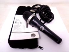 An AKG D5 Microphone in bag together with lead and manual.