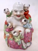 A Chinese glazed porcelain figure,
