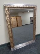 A contemporary decorative gilt framed bevel edged mirror