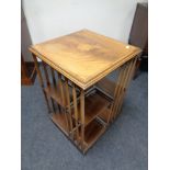 A Victorian style inlaid walnut revolving book stand a/f