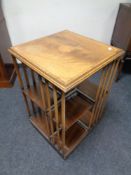 A Victorian style inlaid walnut revolving book stand a/f