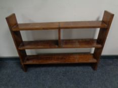 A set of early 20th century oak open bookshelves