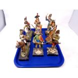 A tray containing eight Italian figures of soldiers on carrara marble bases