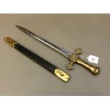 A Victorian brass-hilted bandman's sword in leather sheath