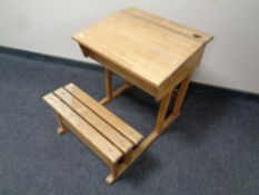 A school desk with seat