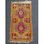 A Caucasian Kazak rug,