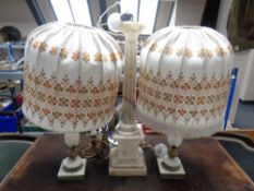 A pair of white marble and brass table lamps with shade together with a further antique Corinthian