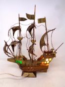 A mid century table lamp in the form of a galleon
