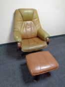 A Unico tan leather swivel adjustable armchair with stool