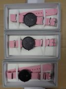 A box containing a quantity of Lyfe wristwatches on fabric straps.
