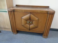 A 1930's oak double door sideboard