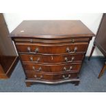 A mahogany Regency style fronted four drawer chest with slide