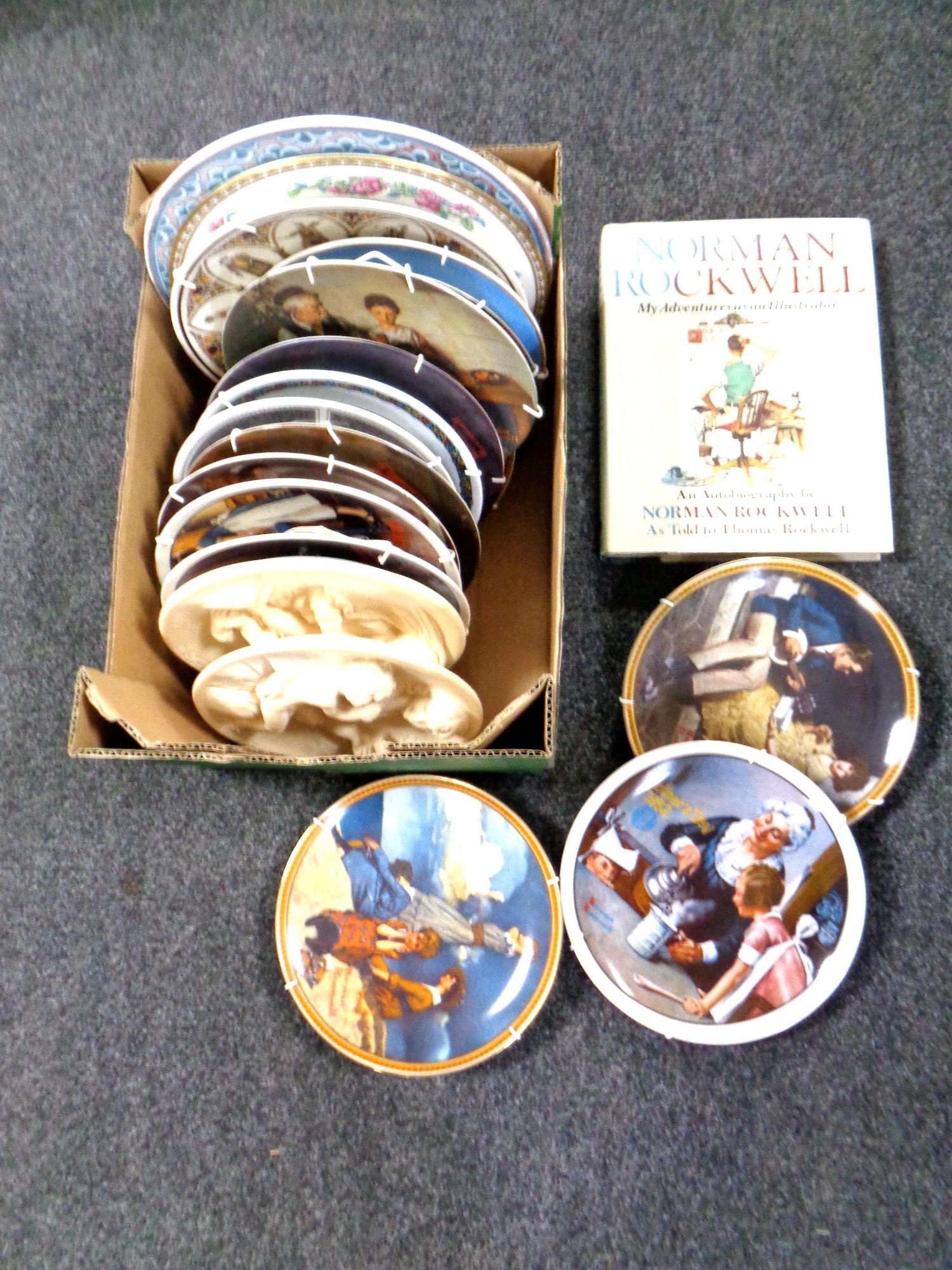 A box containing collectors and cabinet plates to include Norman Rockwell together with an