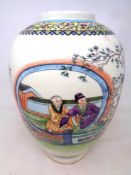A Japanese porcelain vase depicting Geisha, height 32.5 cm.