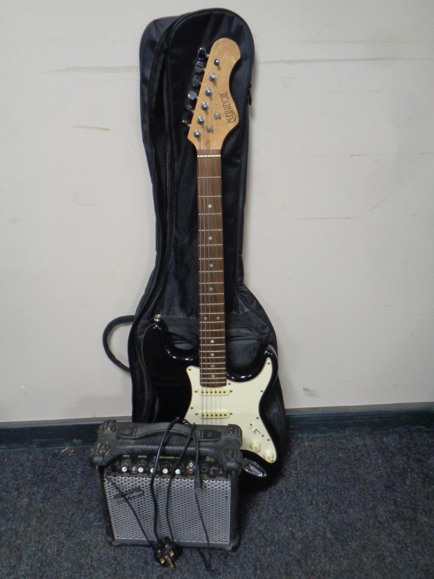 An Elevation electric guitar together with a Gear 4 Music S15G guitar amplifier.