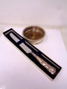 A Birmingham silver and oak wine coaster together with a sterling silver handled bread knife boxed.