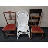 Two Edwardian bedroom chairs together with a set of open bookshelves and a painted wicker