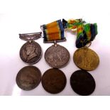 A pair of WWI medals comprising War and Victory medals (ribbons perished) named to 201103 Pte W