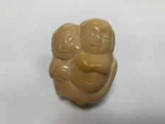 A Japanese bone carving - Erotic Study with Two Lovers.