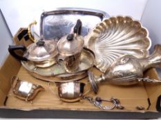 A box of silver plated items including shell dish, four piece tea service, serving tray,