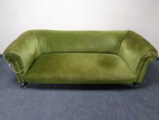 A Victorian Chesterfield settee upholstered green dralon