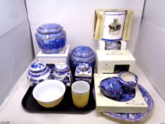 A quantity of boxed and unboxed Ringtons ceramics to include castle and cathedral caddies,
