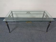A contemporary metal and glass rectangular coffee table