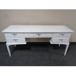 A painted Stag dressing table fitted five drawers