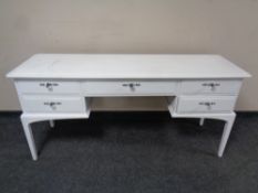 A painted Stag dressing table fitted five drawers