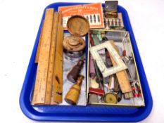 A tray containing a collection of wooden rules, large quantity of fountain pen nibs,