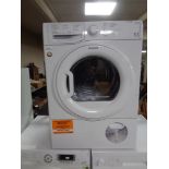 A Hotpoint Aquarius 9kg condenser dryer.