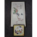 A framed Japanese silkwork panel together with a further hard stone picture depicting birds on a