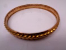 A 9ct gold circular bangle. CONDITION REPORT: 16.