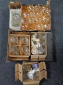 Two boxes containing a large quantity of assorted glassware to include amber glass decanters and