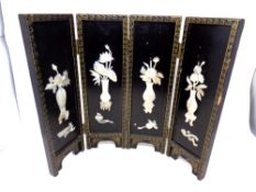 A Japanese lacquered and mother of pearl four-way folding table screen, height 35.