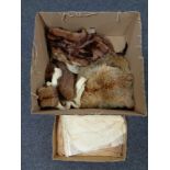 A mink fur cape together with assorted fox fur and mink stoles.