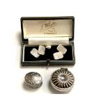 A pair of silver cufflinks and two silver boxes