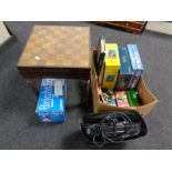 A box containing assorted board games, jigsaw, domino's, card games, together with a paper shredder,