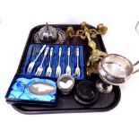 A tray containing metal wares to include silver plated trophy on stand, brass candelabrum,