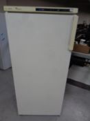 A Phillips Whirlpool upright freezer.