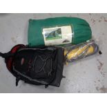 A freeman bubble tent in carry bag together with a heavy duty pump and a Timberland luggage case.