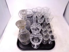 A tray containing antique and later glassware to include a pair of decanters, liqueur glasses,