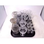 A tray containing antique and later glassware to include a pair of decanters, liqueur glasses,
