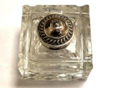 A glass silver mounted inkwell,