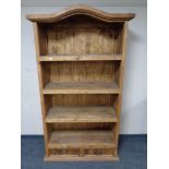 A pine open bookcase