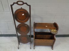 An oak cake stand together with a similar magazine rack