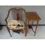 An Edwardian inlaid mahogany two tier occasional table together with a mahogany armchair